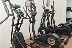 Что делает эллиптический тренажер?